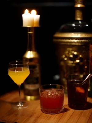 Luxury cocktail bar with crystal glasses and shaker.