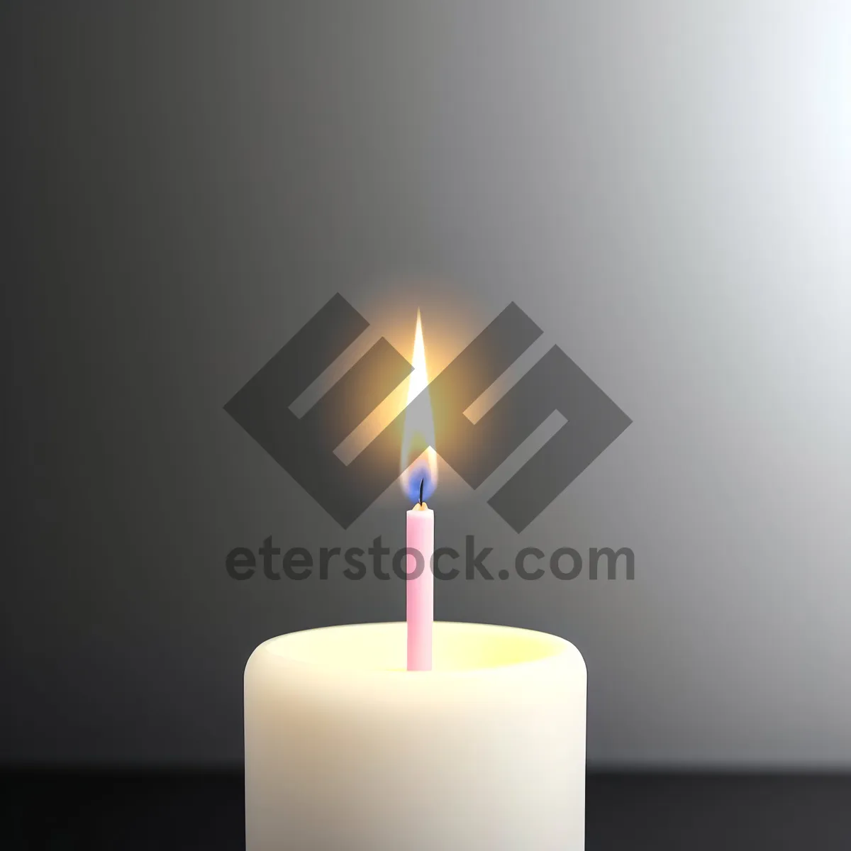 Picture of Candlelight illuminating birthday celebration with flaring flame