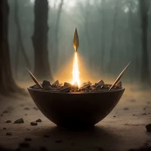 Bowl of Fire: Candlelight Burns in Dark