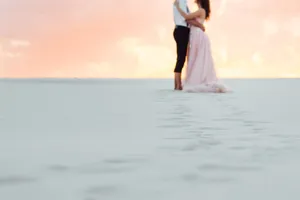 Happy beach bride in sexy fashion dress