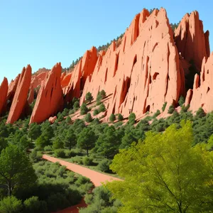 Majestic Sandstone Canyon Landscape with Vibrant Sumac Trees