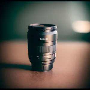 Film Roll and Currency Coins in Metal Can