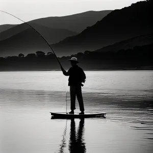 Sunset Fishing: Serene Reflections on Water