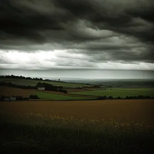 Serene Summer Landscape With Rolling Clouds