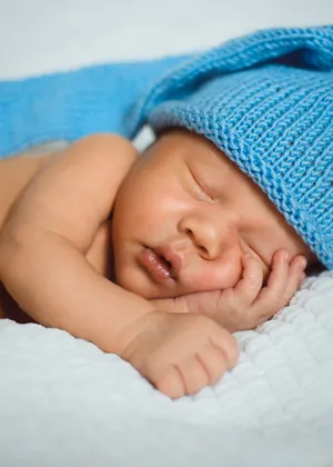 Sweet Toddler Sleeping Peacefully in Soft Towel