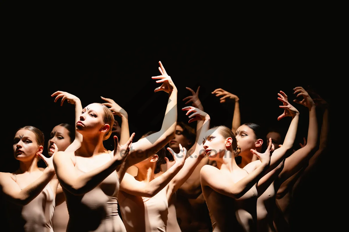 Picture of Attractive fashion dancers performing happy group dance