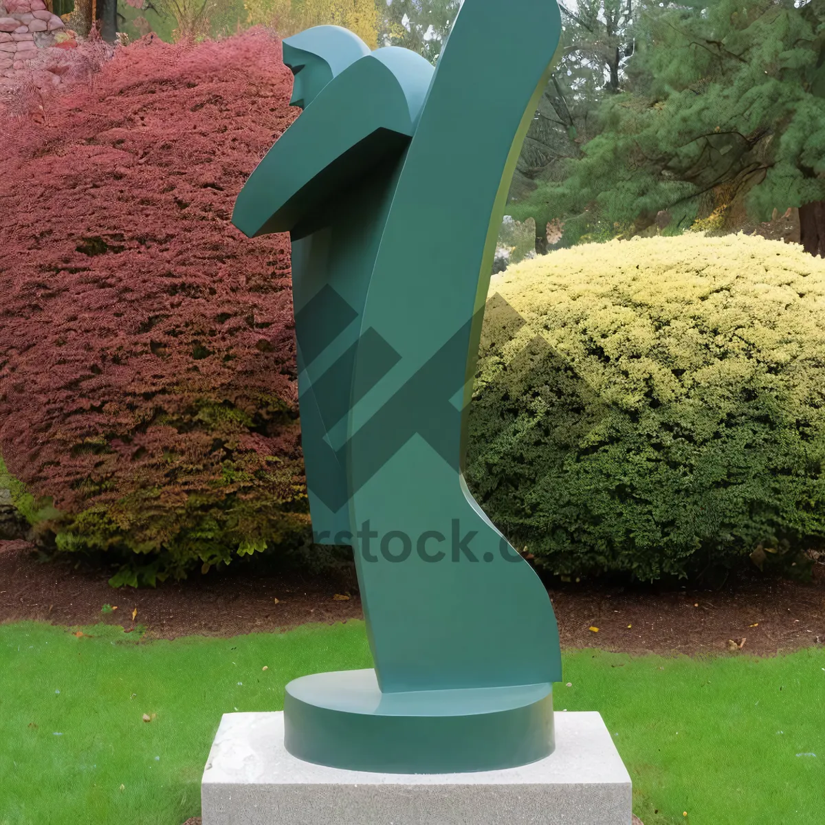 Picture of Timepiece standing on grass in garden.