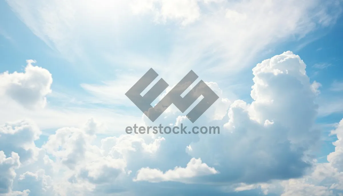 Picture of Bright summer sky landscape with fluffy clouds.