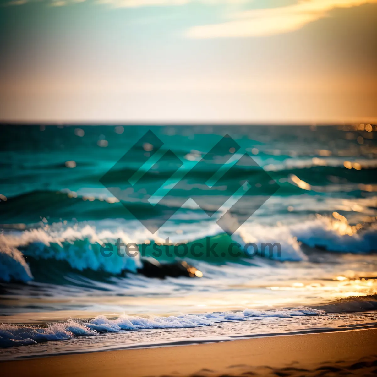 Picture of Serenity by the Sea: Sun-kissed Waves Embrace the Shoreline