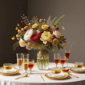 Elegant floral wedding table setting with glassware and plate