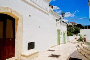 Stucco house in the city skyline