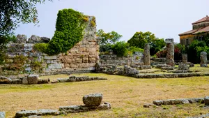 Ancient temple in lush garden landscape.