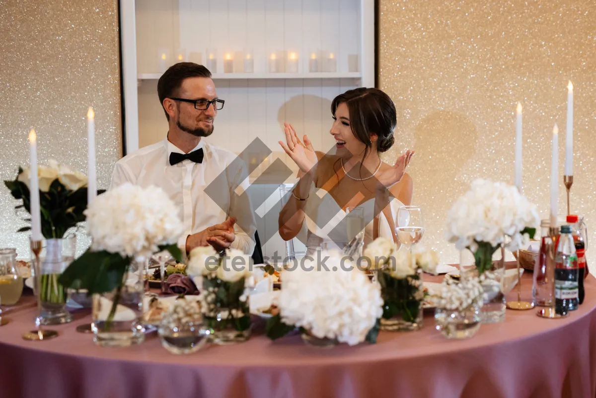 Picture of Happy couple celebrating their wedding day outdoors