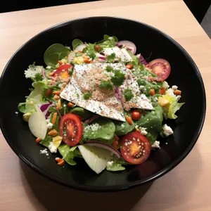 Delicious gourmet salad with fresh vegetables and cheese