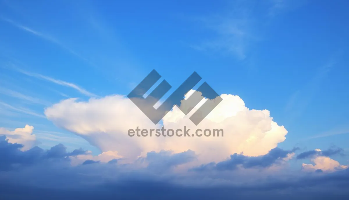 Picture of Vibrant Summer Sky Landscape with Fluffy Clouds