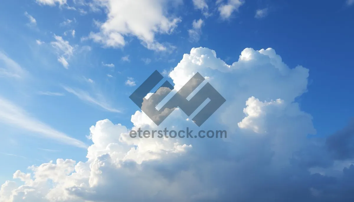 Picture of Vibrant Summer Cloudscape Over Sunny Landscape