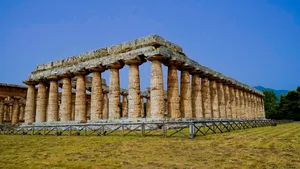 Ancient Roman Temple Columns in Historic City Skyline