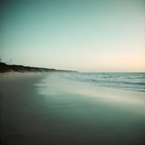 Turquoise Paradise: Serene Beachscape with Clear Waters