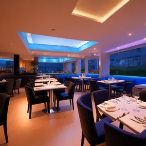 Modern upscale restaurant interior with empty chairs and tables
