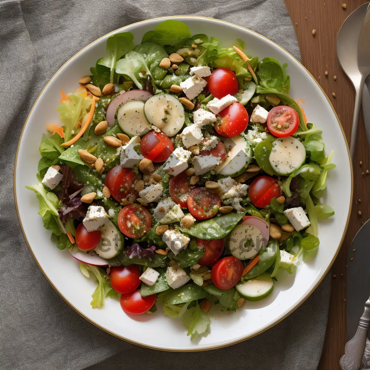 Picture of Fresh vegetable salad with savory sauce on plate