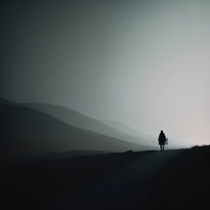 Dune Sunset: Majestic Horizon Over Desert Landscape