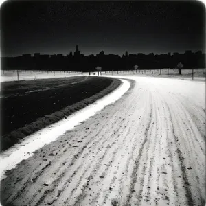 Snowy Expressway: Majestic Skyline and Open Road