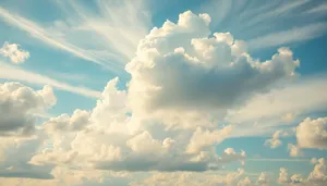 Clear Summer Sky with Fluffy Clouds and Bright Sun