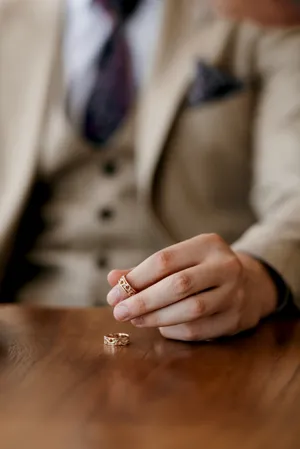 Close-up of person's hand receiving spa treatment.