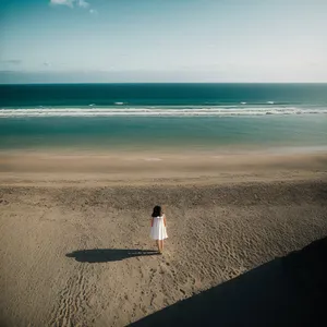 Tropical beach vacation getaway with calm waves rolling in.