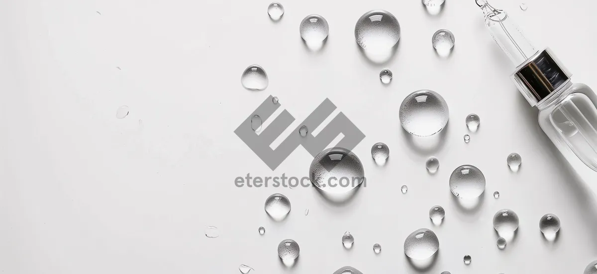 Picture of Fresh water droplets on glass surface.