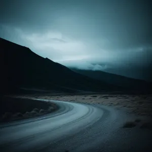 Sunset Drive Along Desert Highway with Majestic Mountains