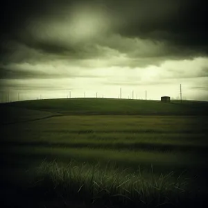 Sweeping Horizon of Vibrant Sunset over Rural Landscape
