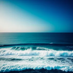 Serenity at Sunset: Tropical Waves Embrace Sandy Beach