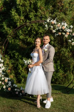 Happy Wedding Couple in Park Celebrating Love and Marriage