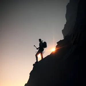 Sunset Cliff Ascent: Majestic Mountain Adventure