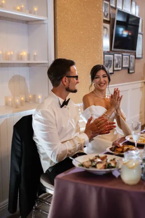 Happy couple enjoying a meal at the restaurant.