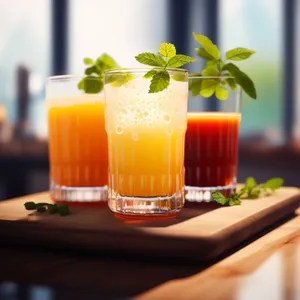 Refreshing Orange Juice Cocktail with Ice and Fresh Fruits