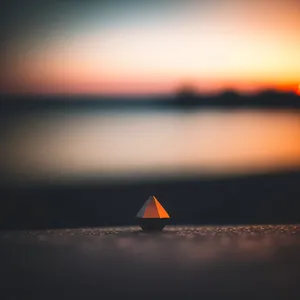 Golden Horizon: Brilliant Sun Setting Over the Ocean