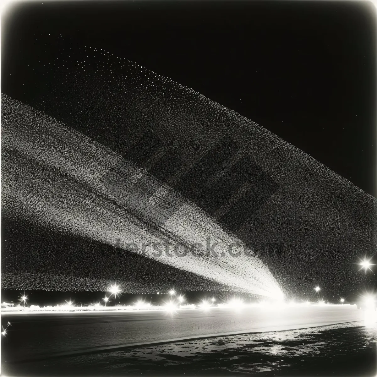 Picture of Nighttime Cityscape featuring Iconic Steel Arch Bridge