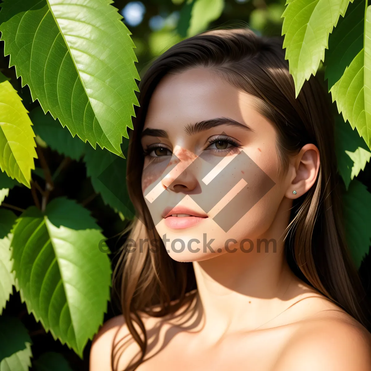 Picture of Smiling Brunette Model with Pretty Plant