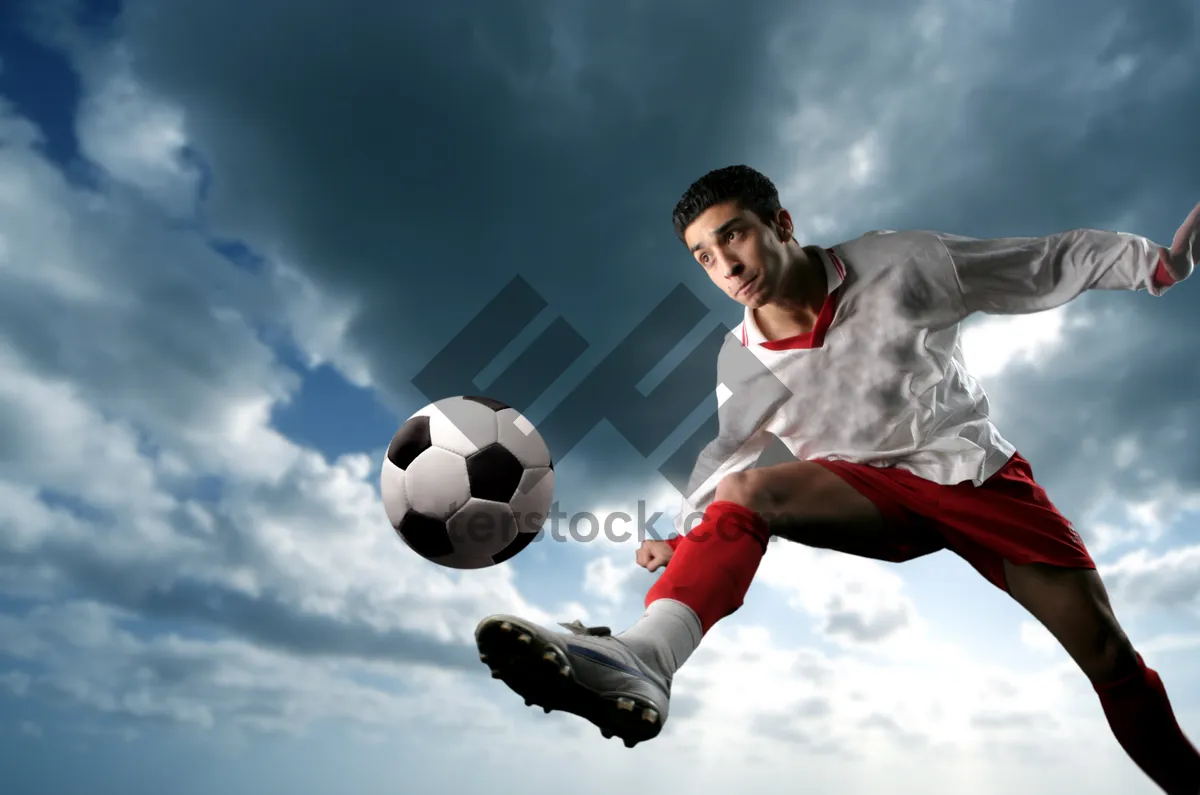 Picture of Vibrant soccer field with glowing stadium lights