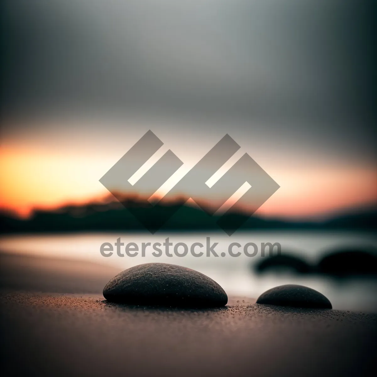 Picture of Tranquil Pebble Stack by the Reflecting Sun