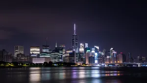 Modern City Skyline by the Water at Dusk.