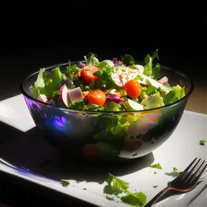 Healthy vegetable salad with fresh tomatoes and peppers.