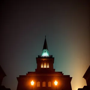 Gilded Minaret illuminates Orthodox Cathedral against cloudy sky.