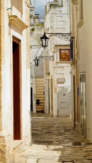 Old architecture with windows and doors on street.