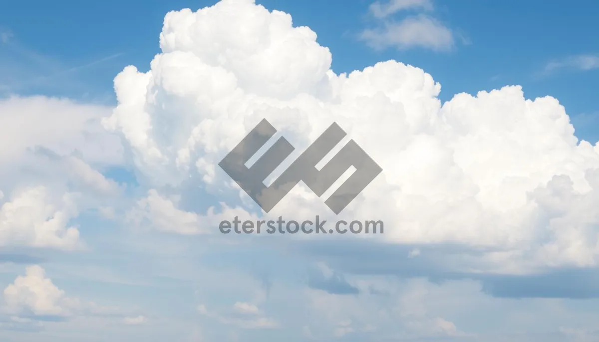 Picture of Vibrant summer sky with fluffy clouds