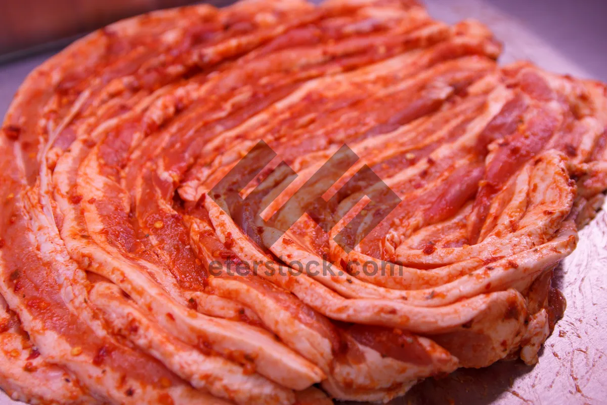 Picture of Delicious gourmet meal with beef and pasta.