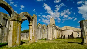 Ancient Stone Cathedral Tower in Historic City Skyline.