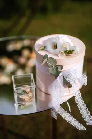 Wedding bouquet on glass cup with tissue paper